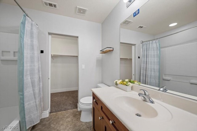 7012 Geese Gathering St, North Las Vegas, NV 89084 - full bath with vanity, a walk in closet, shower / tub combo, and tile patterned floors