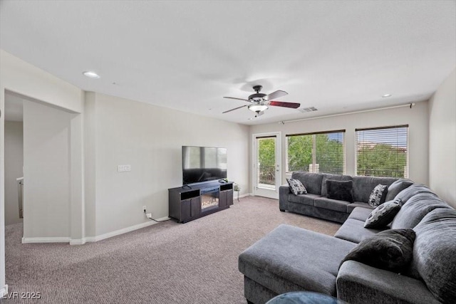 7012 Geese Gathering St, North Las Vegas, NV 89084 - carpeted living area with a ceiling fan and recessed lighting