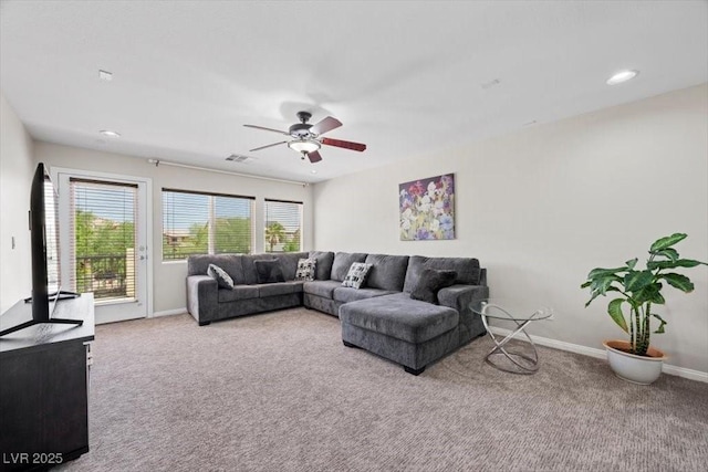 7012 Geese Gathering St, North Las Vegas, NV 89084 - living room with carpet floors, ceiling fan, and recessed lighting