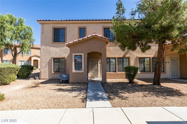 2030 Rancho Lake Dr Unit 201, Las Vegas, NV 89108 - mediterranean / spanish-style house featuring stucco siding and a tiled roof