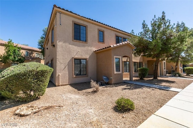 2030 Rancho Lake Dr Unit 201, Las Vegas, NV 89108 - view of front of house featuring stucco siding and a tile roof