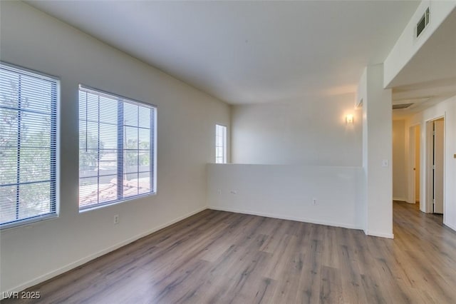 2030 Rancho Lake Dr Unit 201, Las Vegas, NV 89108 - unfurnished room with wood finished floors and baseboards