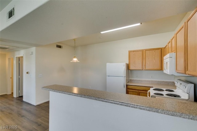 2030 Rancho Lake Dr Unit 201, Las Vegas, NV 89108 - kitchen with white appliances, a peninsula, dark wood-type flooring, and light countertops