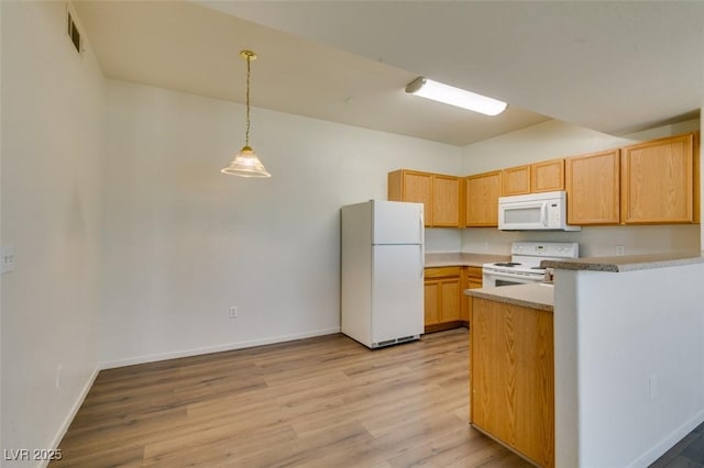 2030 Rancho Lake Dr Unit 201, Las Vegas, NV 89108 - kitchen with white appliances, light wood finished floors, hanging light fixtures, a peninsula, and light countertops