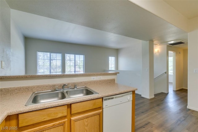 2030 Rancho Lake Dr Unit 201, Las Vegas, NV 89108 - kitchen featuring dishwasher, wood finished floors, and light countertops