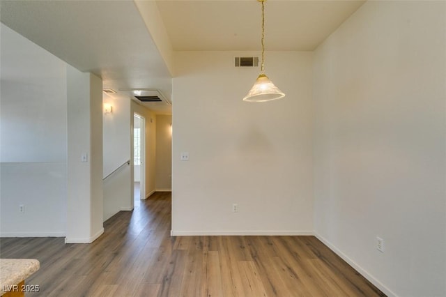 2030 Rancho Lake Dr Unit 201, Las Vegas, NV 89108 - unfurnished dining area with wood finished floors and baseboards