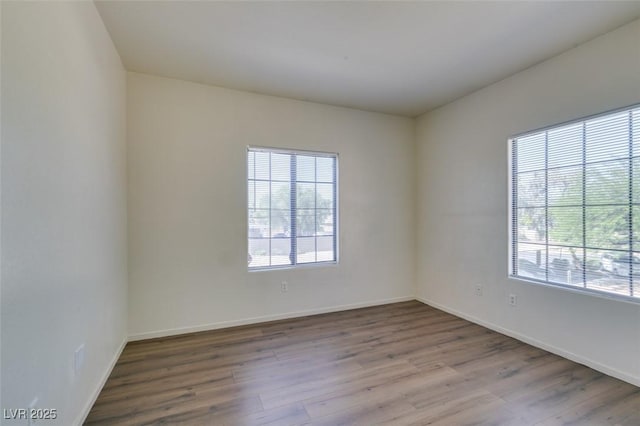 2030 Rancho Lake Dr Unit 201, Las Vegas, NV 89108 - unfurnished room with wood finished floors and baseboards