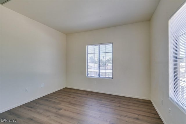 2030 Rancho Lake Dr Unit 201, Las Vegas, NV 89108 - unfurnished room with plenty of natural light and wood finished floors