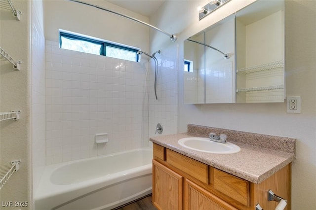2030 Rancho Lake Dr Unit 201, Las Vegas, NV 89108 - bathroom with bathtub / shower combination, vanity, and wood finished floors