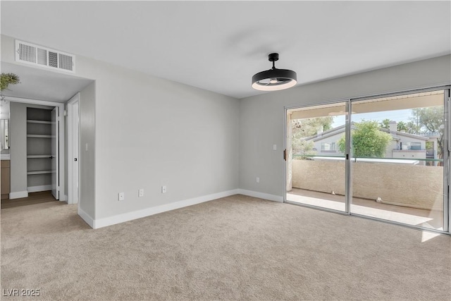 5710 E Tropicana Ave Unit 2152, Las Vegas, NV 89122 - unfurnished room featuring carpet flooring