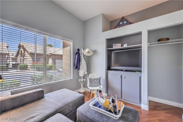 4770 Big Draw Dr, North Las Vegas, NV 89031 - living room with baseboards and wood finished floors