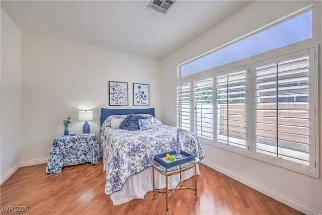 4770 Big Draw Dr, North Las Vegas, NV 89031 - bedroom featuring baseboards and wood finished floors