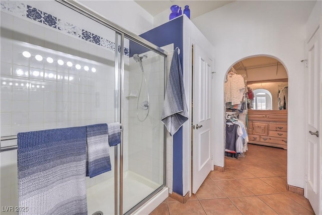 4770 Big Draw Dr, North Las Vegas, NV 89031 - bathroom featuring a shower stall, tile patterned floors, and a closet