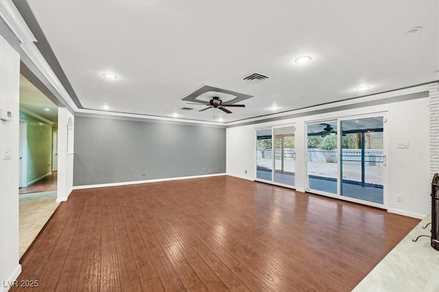 1885 Valley Dr, Las Vegas, NV 89108 - spare room with a ceiling fan, wood finished floors, crown molding, and recessed lighting