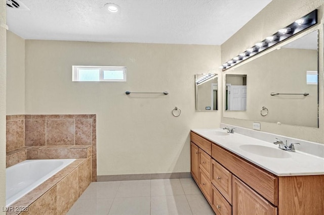 1885 Valley Dr, Las Vegas, NV 89108 - full bathroom featuring a garden tub, double vanity, and tile patterned floors