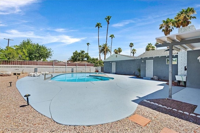 1885 Valley Dr, Las Vegas, NV 89108 - view of swimming pool featuring a patio and a fenced backyard