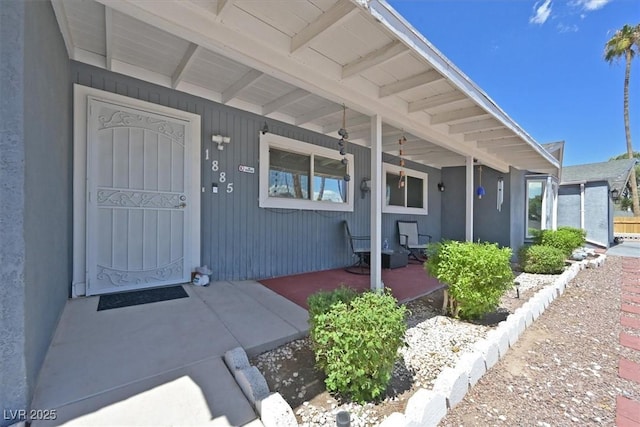1885 Valley Dr, Las Vegas, NV 89108 - doorway to property featuring a porch