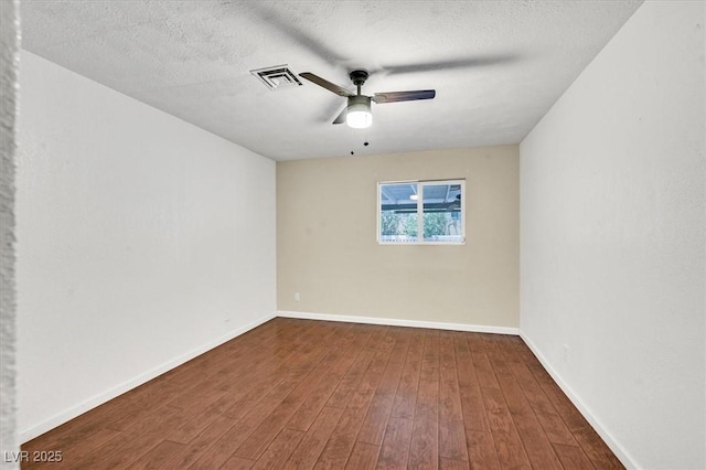 1885 Valley Dr, Las Vegas, NV 89108 - unfurnished room featuring ceiling fan, wood finished floors, and a textured ceiling