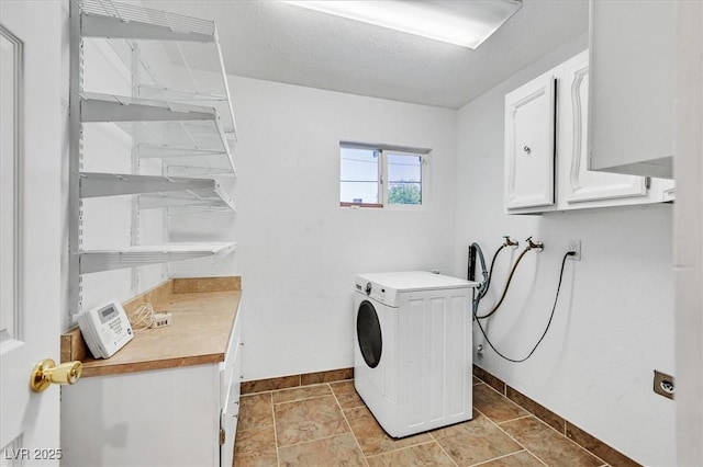 1885 Valley Dr, Las Vegas, NV 89108 - laundry area featuring washer / clothes dryer and cabinet space