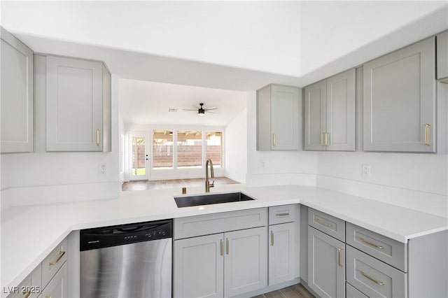 3622 Covewick Dr, North Las Vegas, NV 89032 - kitchen with stainless steel dishwasher, gray cabinets, light countertops, and a ceiling fan