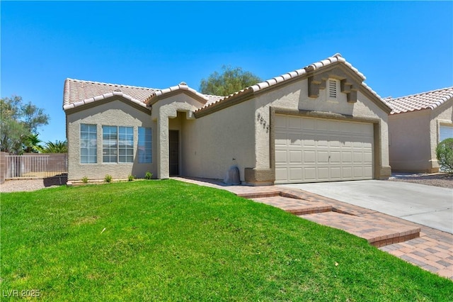3622 Covewick Dr, North Las Vegas, NV 89032 - view of front of home with a garage, driveway, stucco siding, and a tile roof