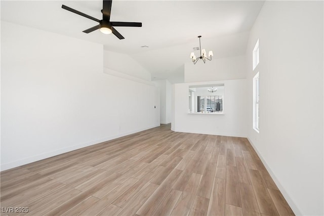 3622 Covewick Dr, North Las Vegas, NV 89032 - unfurnished living room with a chandelier, light wood finished floors, lofted ceiling, and a ceiling fan