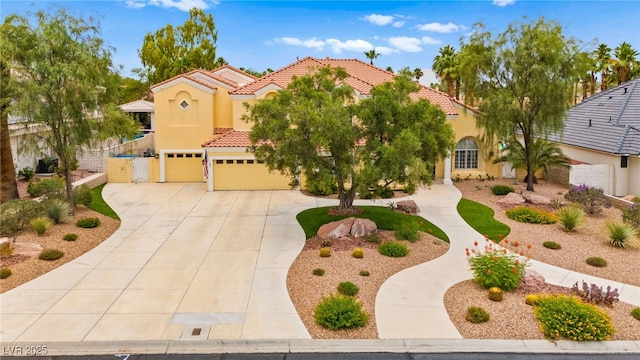 7428 Doe Ave, Las Vegas, NV 89117 - mediterranean / spanish-style home featuring a tiled roof, a garage, concrete driveway, and stucco siding