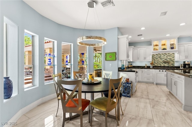 7428 Doe Ave, Las Vegas, NV 89117 - dining area with healthy amount of natural light and recessed lighting