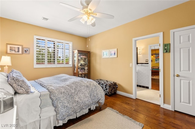 7428 Doe Ave, Las Vegas, NV 89117 - bedroom with wood finished floors and ceiling fan