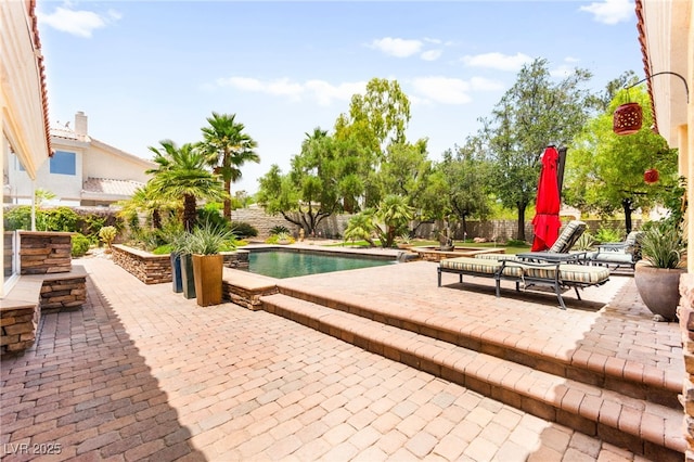 7428 Doe Ave, Las Vegas, NV 89117 - view of pool featuring a patio and a fenced backyard