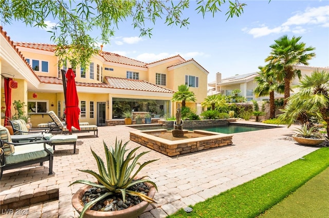 7428 Doe Ave, Las Vegas, NV 89117 - surrounding community featuring a patio area and a pool