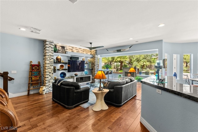 7428 Doe Ave, Las Vegas, NV 89117 - living room with wood finished floors, ceiling fan, and recessed lighting
