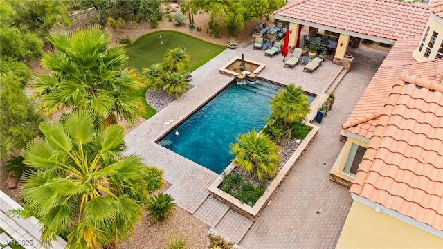 7428 Doe Ave, Las Vegas, NV 89117 - outdoor pool with an area to practice putting, a patio area, and outdoor lounge area