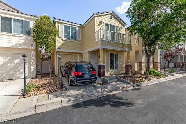 1739 Spanish Sky Ave, Las Vegas, NV 89183 - view of property with driveway, a balcony, and an attached garage