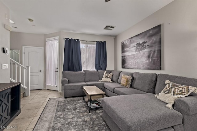 1739 Spanish Sky Ave, Las Vegas, NV 89183 - living room with light tile patterned floors and stairs