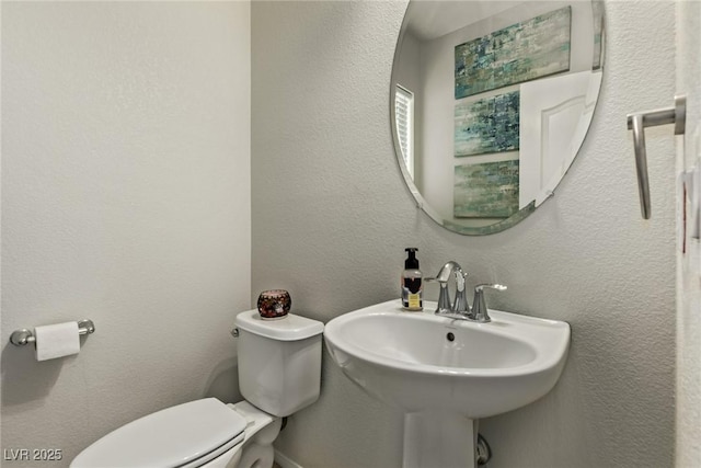 1739 Spanish Sky Ave, Las Vegas, NV 89183 - half bath featuring toilet and a sink