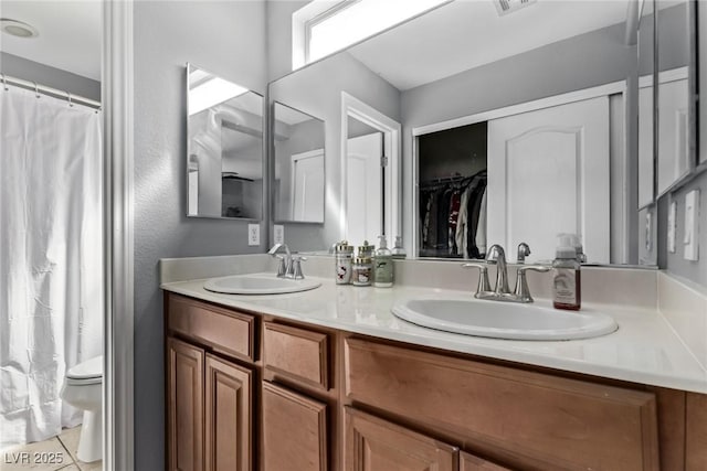 1739 Spanish Sky Ave, Las Vegas, NV 89183 - full bathroom with double vanity and tile patterned floors