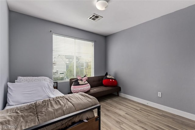 1739 Spanish Sky Ave, Las Vegas, NV 89183 - bedroom with light wood-style floors and baseboards