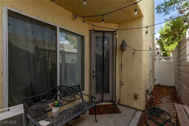 1739 Spanish Sky Ave, Las Vegas, NV 89183 - doorway to property featuring stucco siding