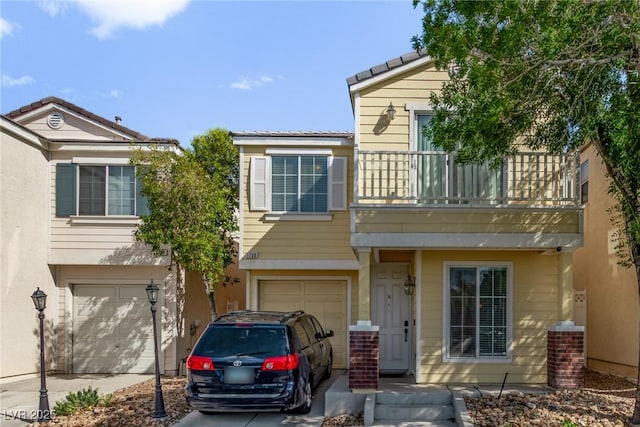 1739 Spanish Sky Ave, Las Vegas, NV 89183 - view of front of home with a garage, a balcony, and driveway