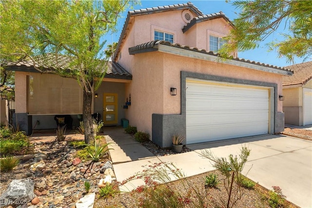 3650 Russian Olive St, North Las Vegas, NV 89032 - view of front of house with stucco siding, a tiled roof, a garage, and concrete driveway