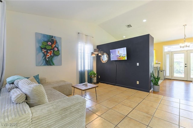 3650 Russian Olive St, North Las Vegas, NV 89032 - living room featuring light tile patterned floors, lofted ceiling, a chandelier, and recessed lighting