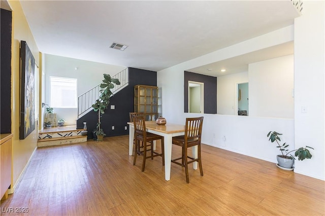3650 Russian Olive St, North Las Vegas, NV 89032 - dining area with wood finished floors and stairs