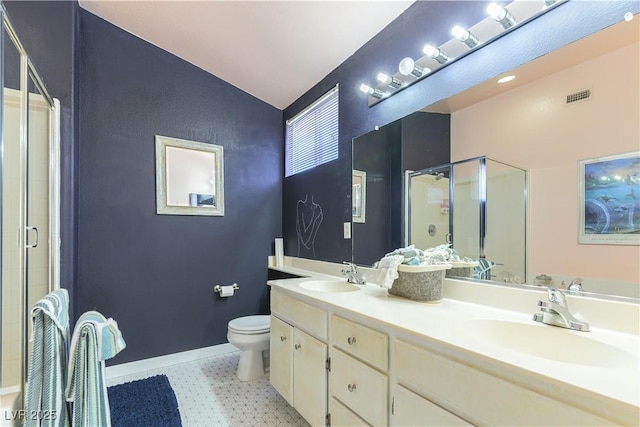 3650 Russian Olive St, North Las Vegas, NV 89032 - bathroom with a stall shower, double vanity, and lofted ceiling
