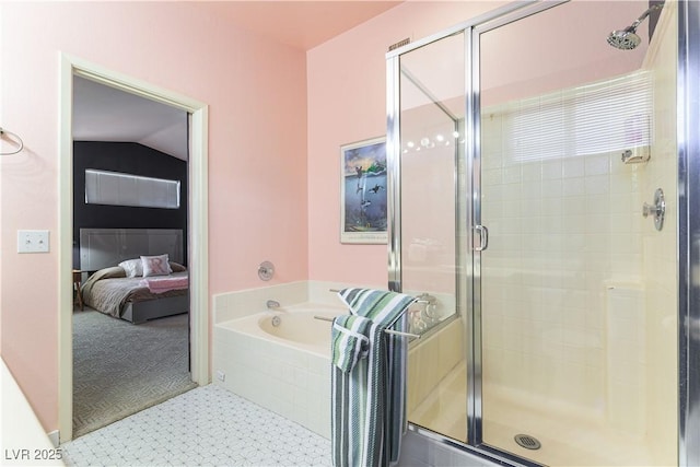 3650 Russian Olive St, North Las Vegas, NV 89032 - full bath with ensuite bath, a bath, a stall shower, and vaulted ceiling
