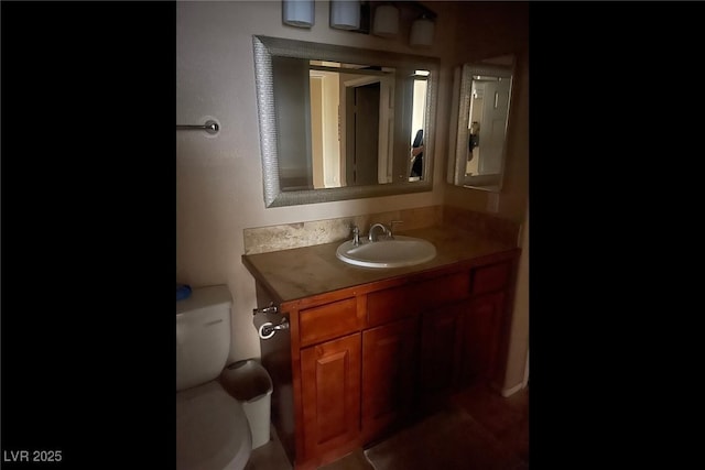 7155 S Durango Dr Unit 102, Las Vegas, NV 89113 - bathroom with vanity and toilet