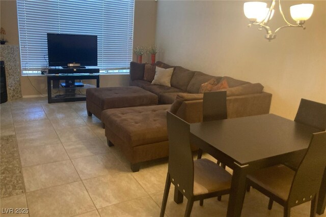 7155 S Durango Dr Unit 102, Las Vegas, NV 89113 - living area featuring a chandelier and light tile patterned flooring