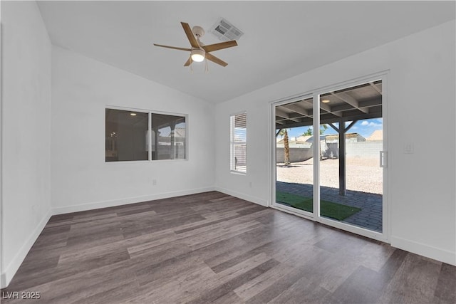 6129 Bedrock Ct, North Las Vegas, NV 89031 - unfurnished room with dark wood-style flooring, lofted ceiling, and ceiling fan