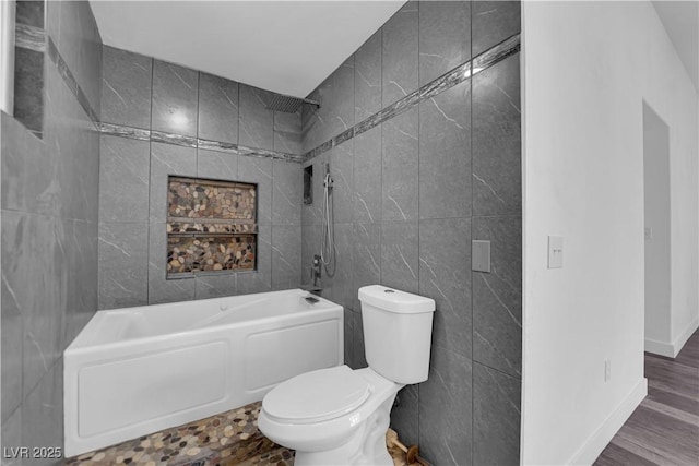 6129 Bedrock Ct, North Las Vegas, NV 89031 - bathroom with tile walls,  shower combination, and wood finished floors