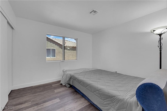 6129 Bedrock Ct, North Las Vegas, NV 89031 - bedroom featuring wood finished floors and a closet